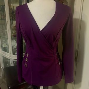 Dark purple v-neck knit long sleeve top.